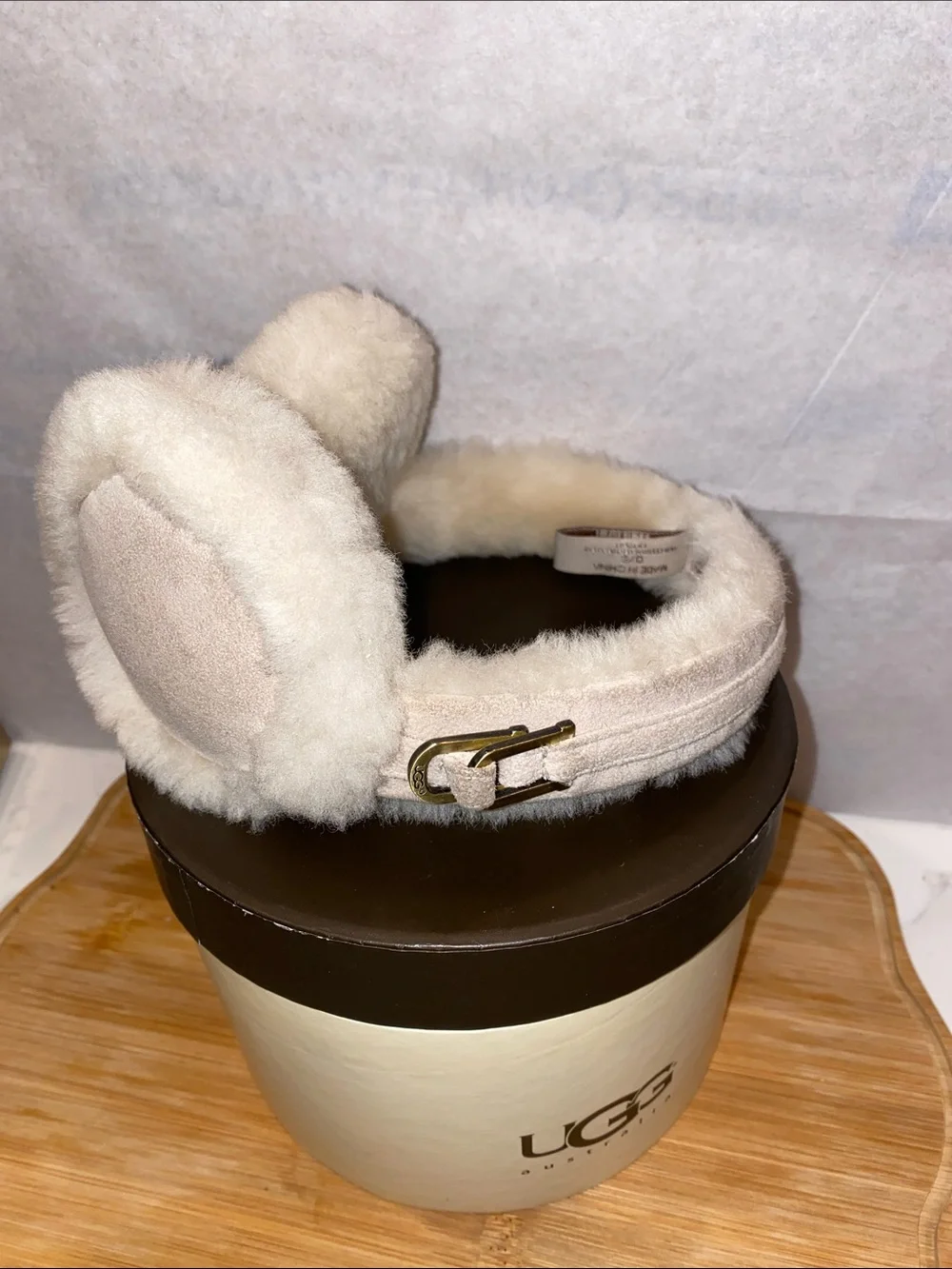 UGG Plush Shearling Ear Muffs in Light Beige with Gold Buckle